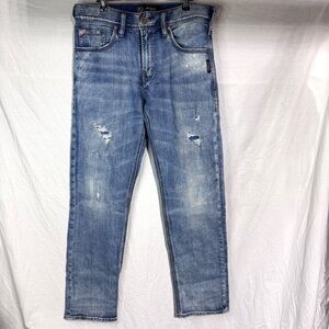 Silver Jeans Eddie light wash distressed jeans Size 31x32
